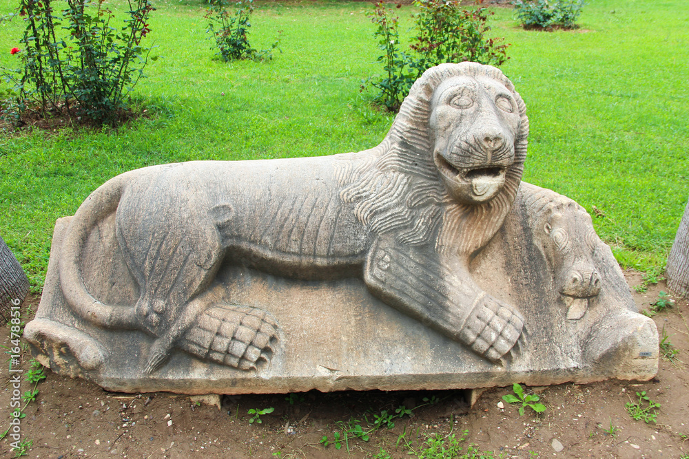 Ancient stone lion - the cover of the Lycian sarcophagus in a Park on the street next to Antalya archaeological Museum. Turkey
Ancient stone lion - the cover of the Lycian sarcophagus in a Park on the street next to Antalya archaeological Museum. Turkey