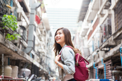 Young asian lady travel in city center