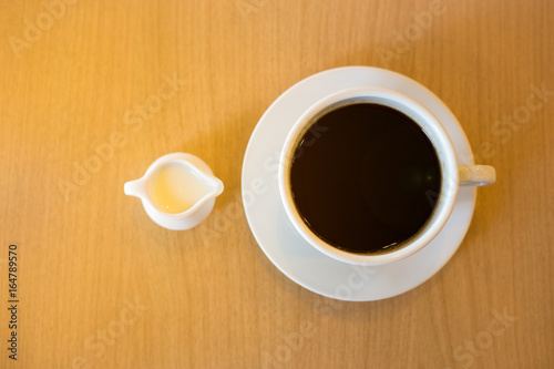 A cup of condensed milk and coffee