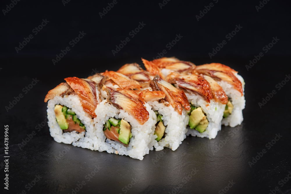 Sushi on black background. Perfect for creating sushi restaurant menu. Part of series. Sushi on black background. Perfect for creating sushi restaurant menu. Part of series.
