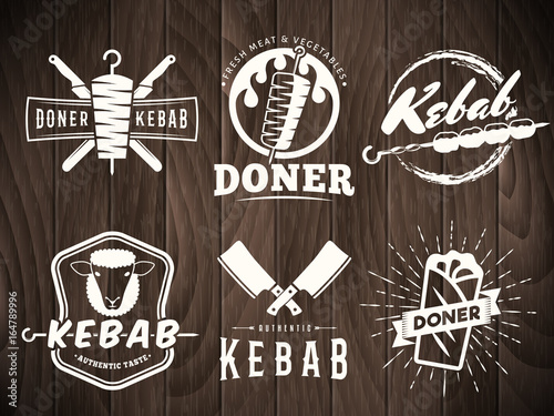 Doner kebab logos. Vector kebab badges with traditional eastern grill dishes on the wooden background. Vintage labels for restaurant or bar.