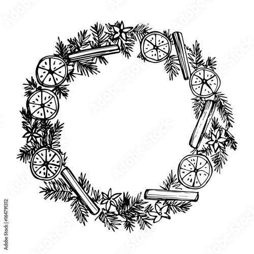 Christmas wreath with cinnamon and oranges
