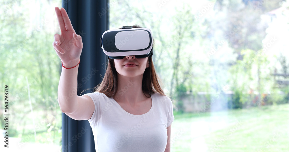 woman using VR-headset glasses of virtual reality