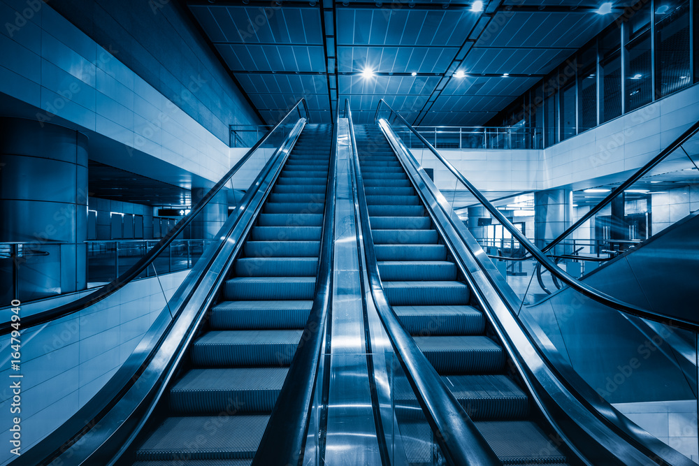 detail shot of escalator in modern buildings or subway station. detail shot of escalator in modern buildings or subway station.