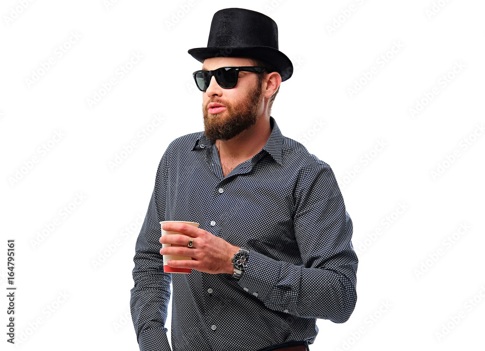A man holds paper coffee glass. A man holds paper coffee glass.