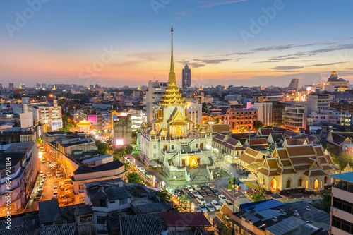 Aerial view cityscape twilight of Wat Trimit Witthayaram Worawihan and chinatown or yaowarat area  Temple of the Golden Buddha in Bangkok  Thailand.