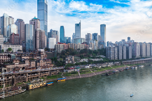 River And Modern Buildings Against Sky in city of China. © fanjianhua