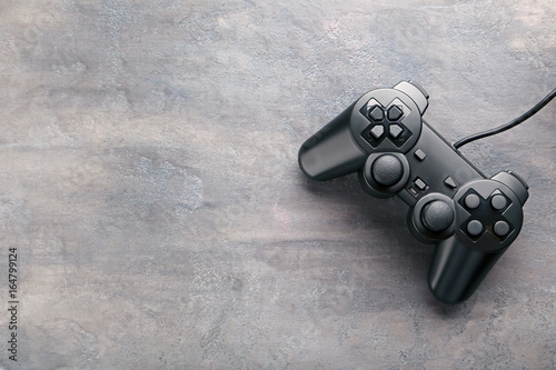 Black joystick on a grey wo...