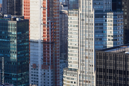 New York City Manhattan skyscrapers aerial view under construction in the evening sunlight