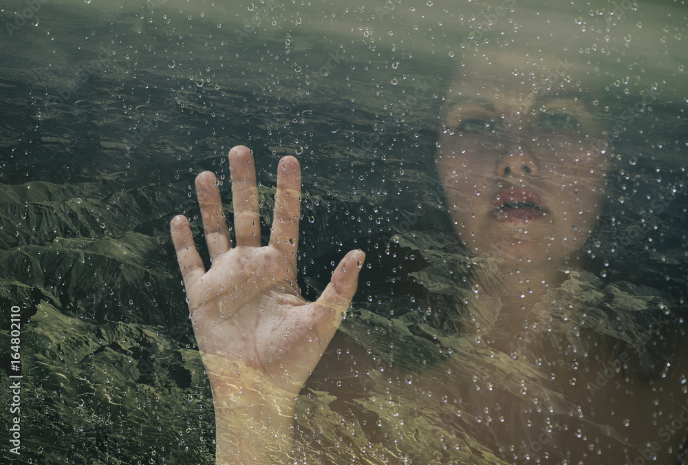 Double exposure of the female hand and face and the mountain of Italy Double exposure of the female hand and face and the mountain of Italy
