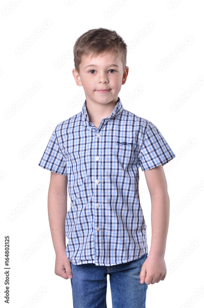 Schoolboy in fashionable blue checkered shirt on white background Schoolboy in fashionable blue checkered shirt on white background