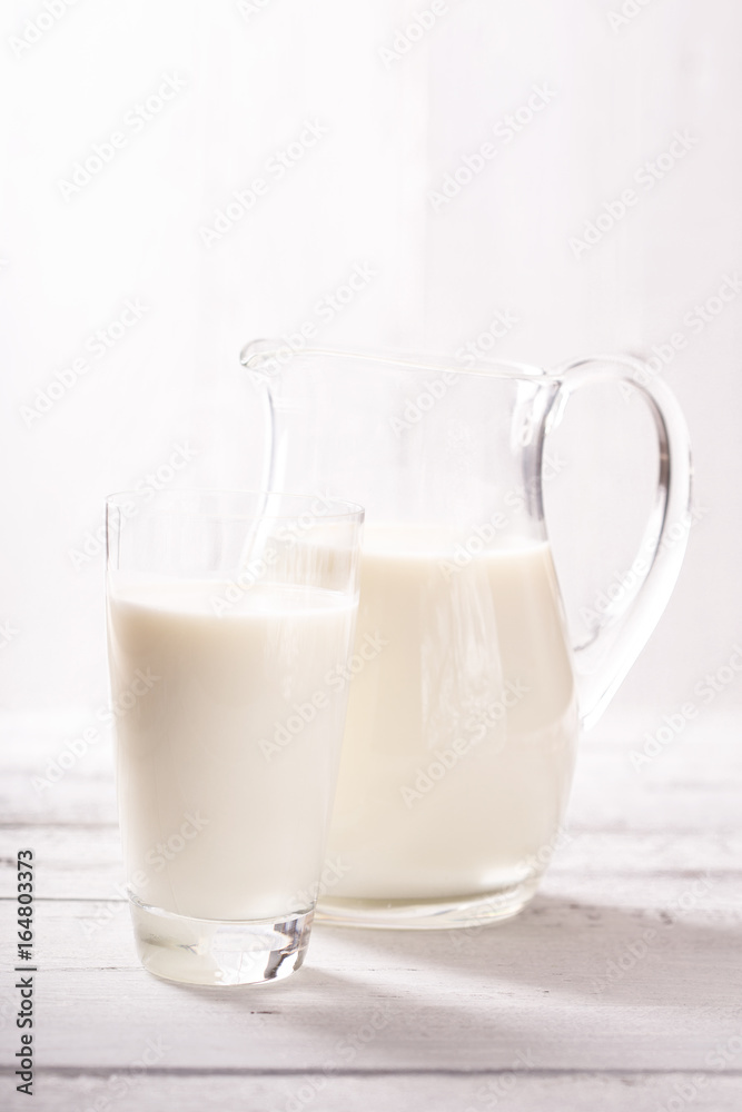 Milk jug and glass milk