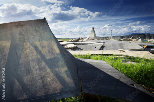 Photography the wreckage of the pyramid in the Moscow region on the background of new small