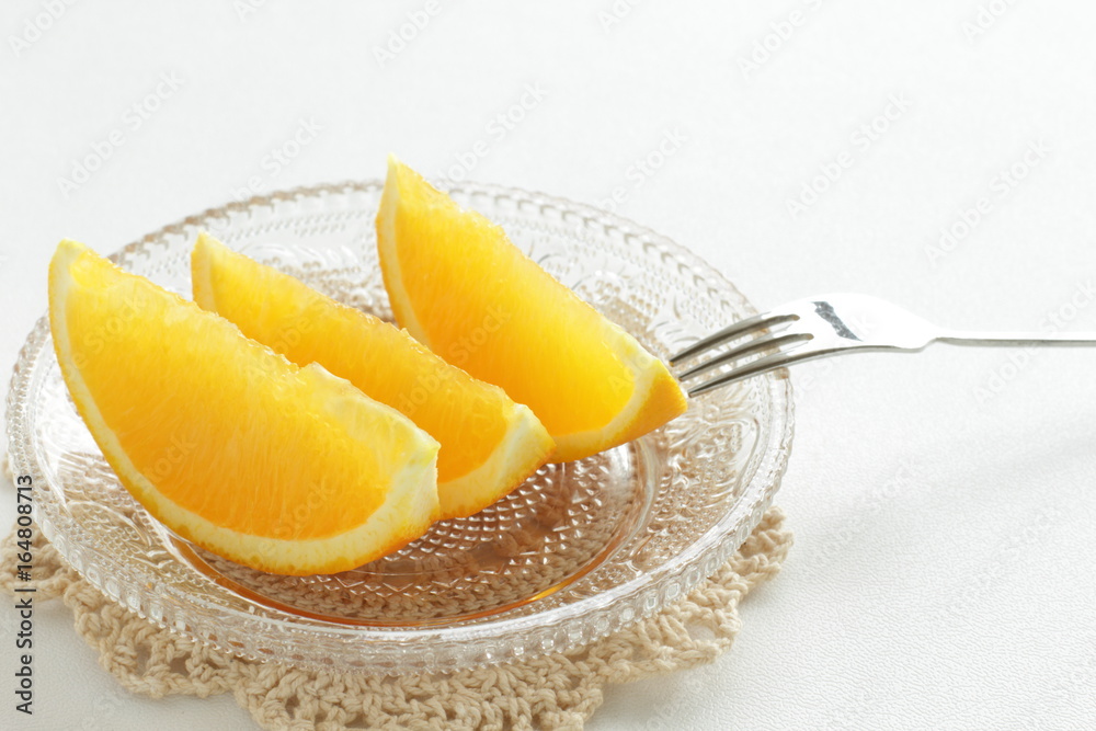 freshness orange on glass plate for healthy dessert image