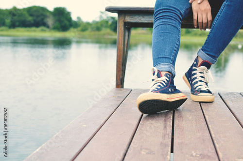 Feet of hipster women in park and nature background, Relax time on holiday