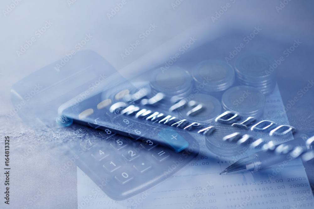 Double exposure Rows of coins of Credit cards on the table,finance and business concept,Money,soft focus and blurred style,dark tone. Double exposure Rows of coins of Credit cards on the table,finance and business concept,Money,soft focus and blurred style,dark tone.