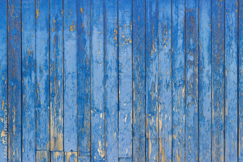Old wooden background with shabby blue paint