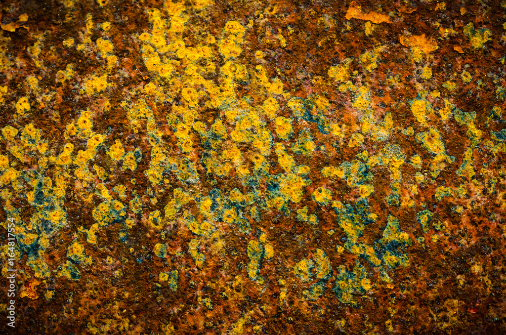 Rusty iron and the remnants of gray paint. Rusty iron and the remnants of gray paint.