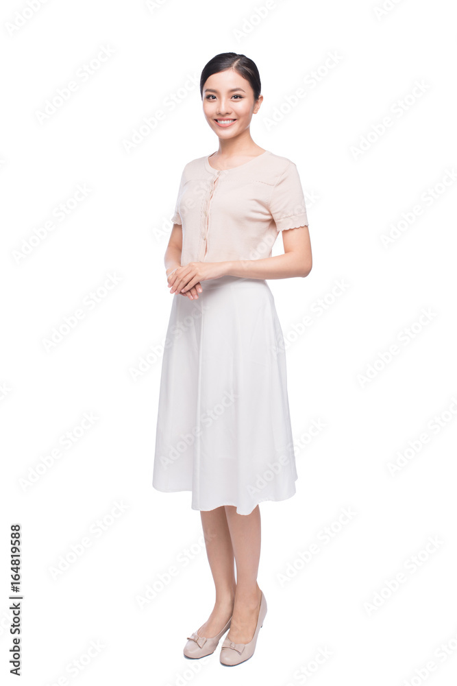 Full length of pretty young Vietnamese girl standing. Full length of pretty young Vietnamese girl standing.
