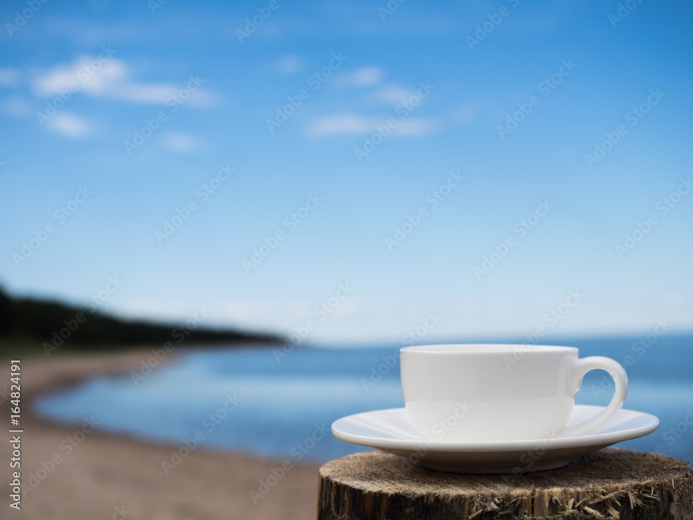 Coffee espresso on wood table nature background on the beach, Beauty nature background Coffee espresso on wood table nature background on the beach, Beauty nature background