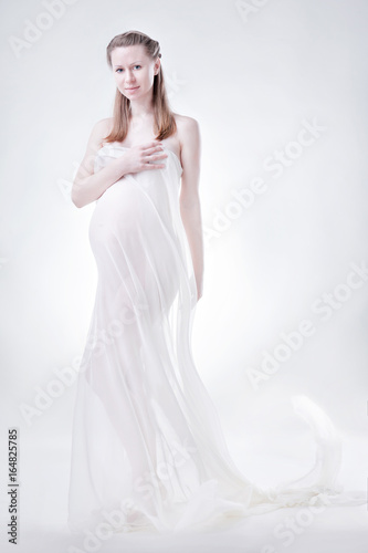 The pregnant woman in studio