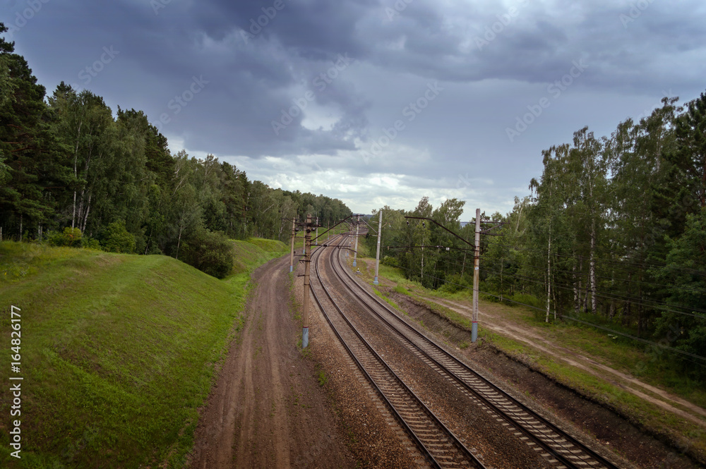 Obraz premium empty railway with dark skies