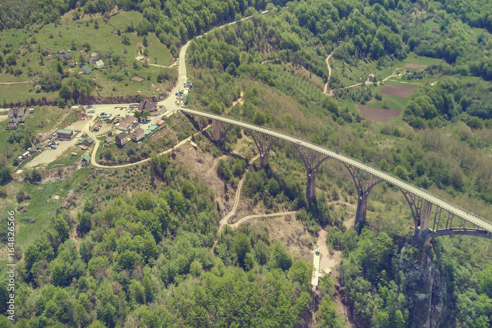 Top view of a transport bridge in the mountains, top view