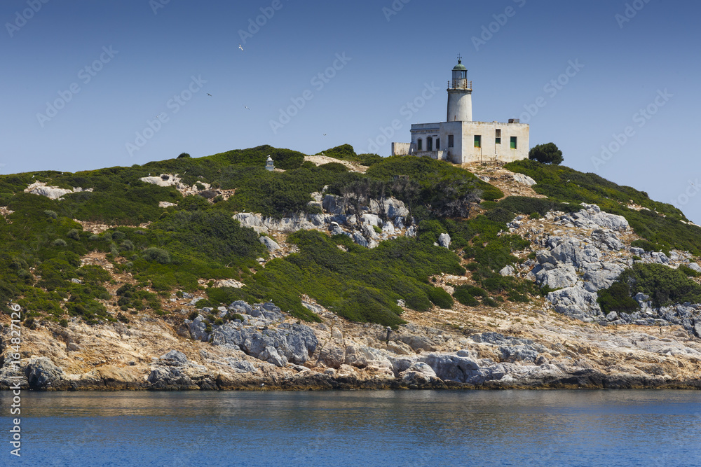 Lighthouse on Repi islet near Skiathos island, Greece.
