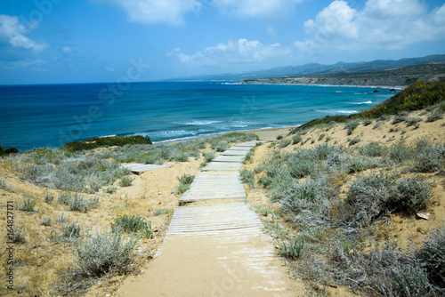 Wooden boardwalk to the beach