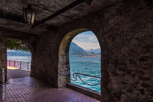 View form medieval arch on lake Como, Italy