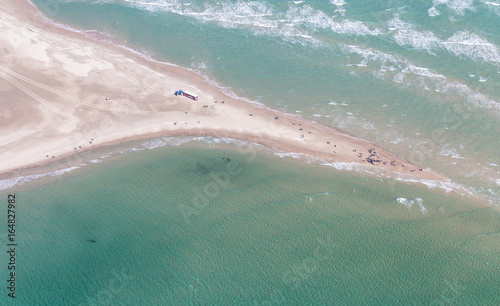 Fototapeta Naklejka Na Ścianę i Meble -  Aerial view of Greenen Denmark,where the to seas meet (Baltic sea and North sea)Greenen is the northern most top of Denmark,and here the lands end.