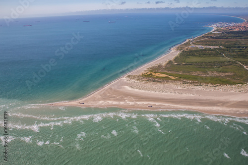 Fototapeta Naklejka Na Ścianę i Meble -  Aerial view of Greenen Denmark,where the to seas meet (Baltic sea and North sea)Greenen is the northern most top of Denmark,and here the lands end.