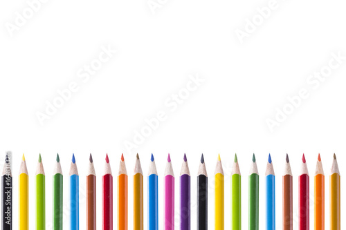 Colored pencils on a white background. Fence.