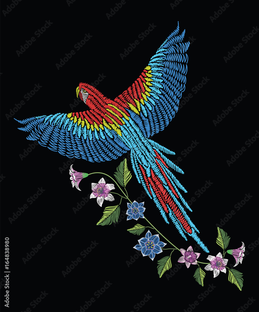 Fototapeta premium Macaw ara parrot with narcissus, tulip anfd lily flower. Embroidery stitches stylized vector illustration. Traditional floral pattern for textile.