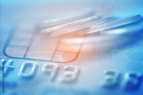 Double exposure Rows of coins of Credit cards on the table,finance and business concept,Money,soft focus and blurred style,dark tone.