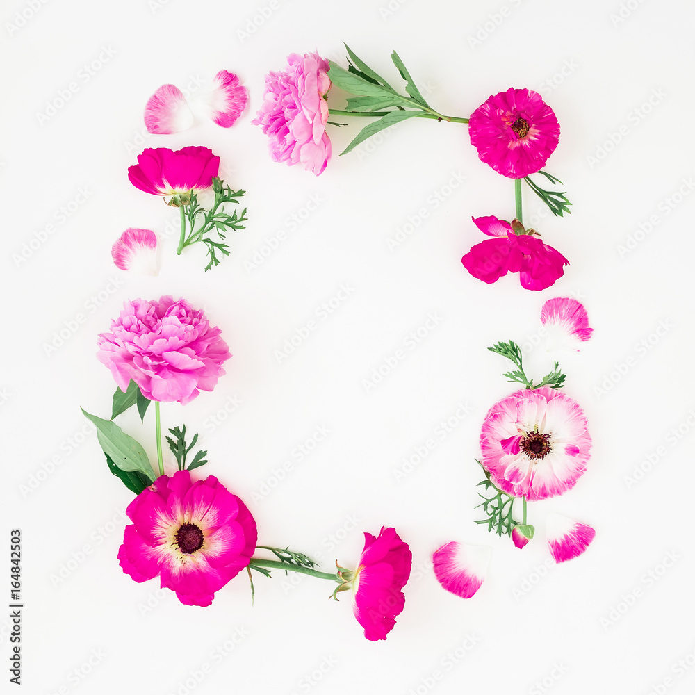 Floral frame of pink flowers on white background. Floral composition. Flat lay, top view.