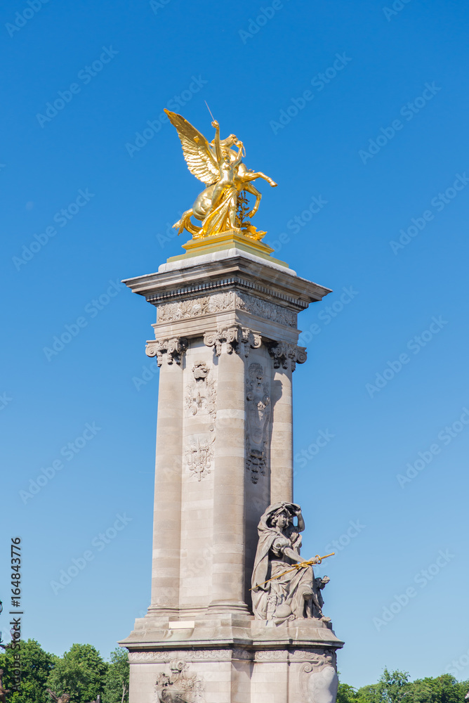     Paris, pont Alexandre III, golden statue on the bridge 
