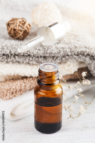 Spa composition with essential oil and towels