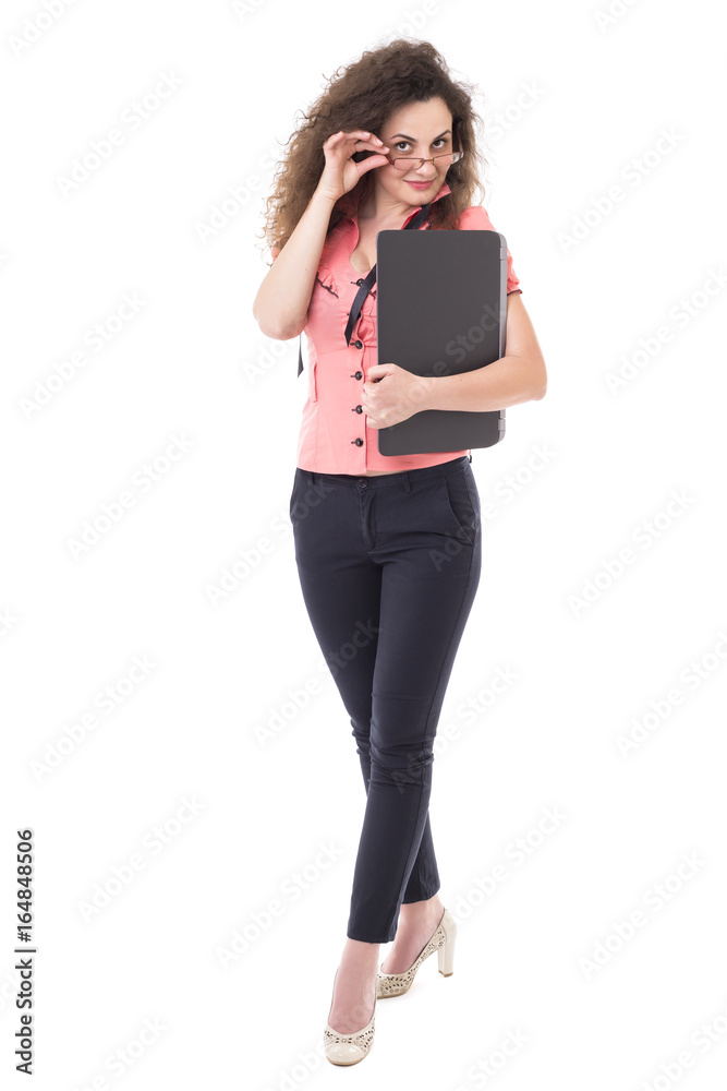 Beautiful young businesswoman holding her laptop