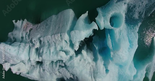 Ice Berg In Green Water Lake - Aerial Footage of Glacial Lake in Jökulsárlón, Iceland