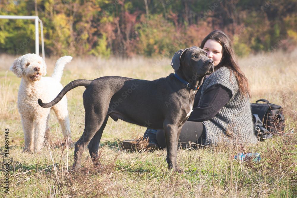 Girl with her cane corso puppy Girl with her cane corso puppy