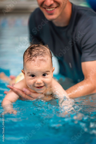 Smilling baby boy in swimming pool © Microgen