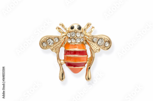Golden brooch bee with diamonds isolated on white