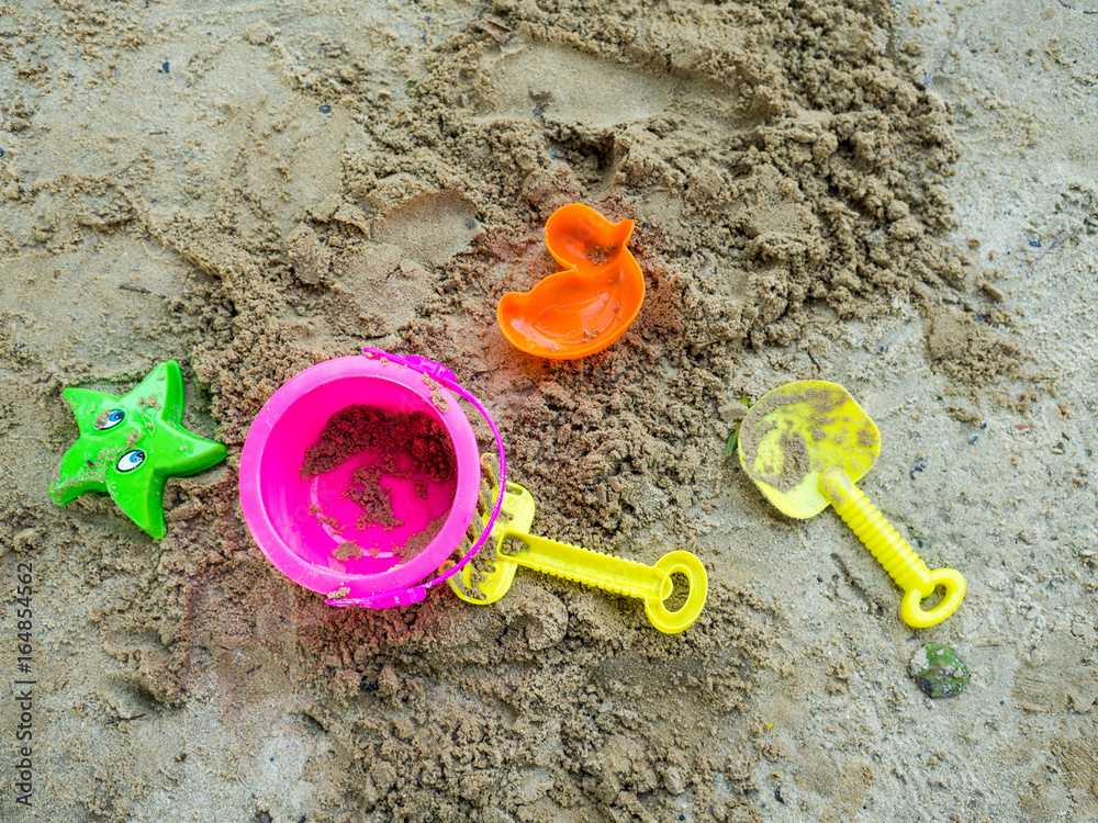 Toys for sand digging it have a beautiful color Lay on the sand. Toys for sand digging it have a beautiful color Lay on the sand.