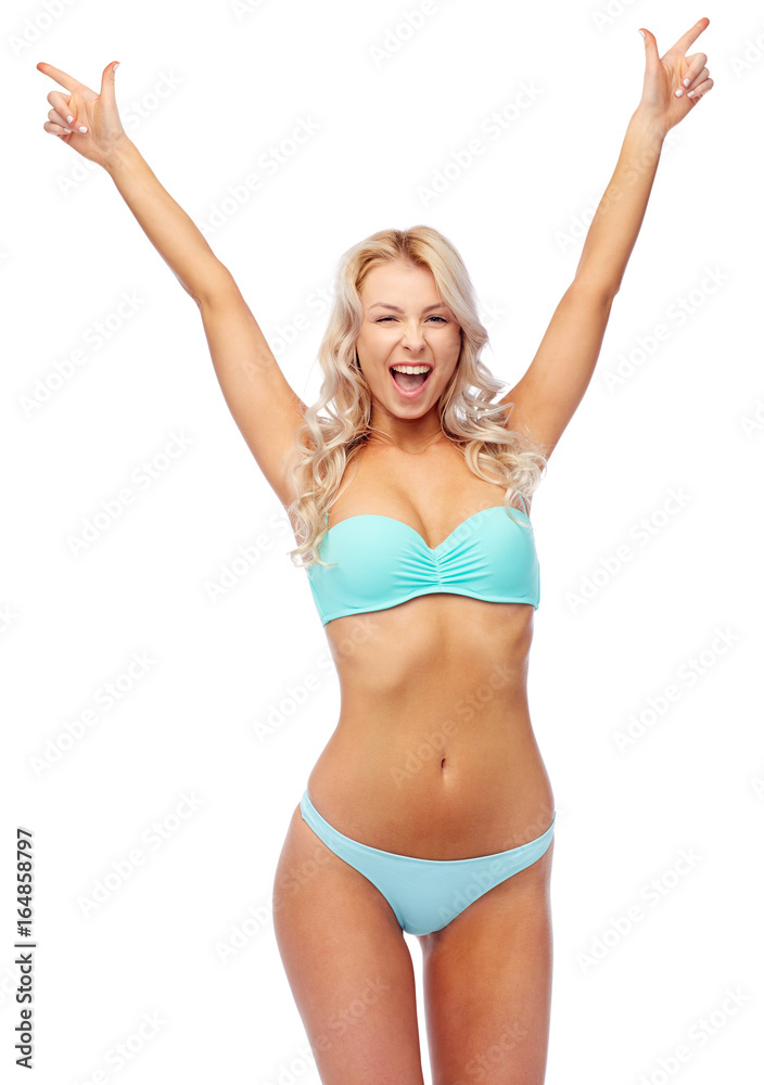 happy young woman in bikini with raised hands happy young woman in bikini with raised hands