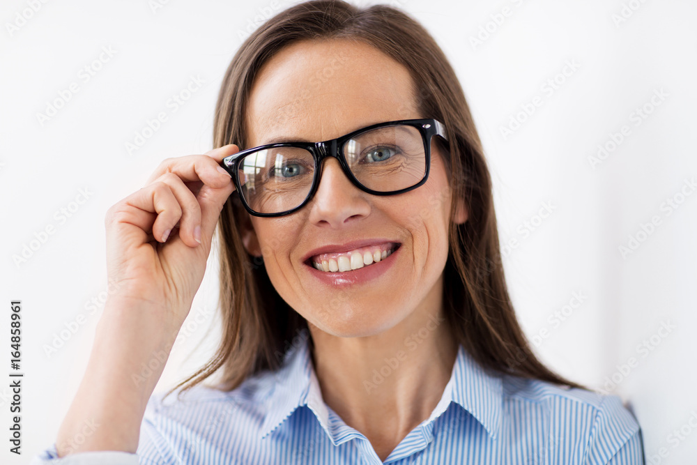 close up of smiling middle aged woman in glasses close up of smiling middle aged woman in glasses