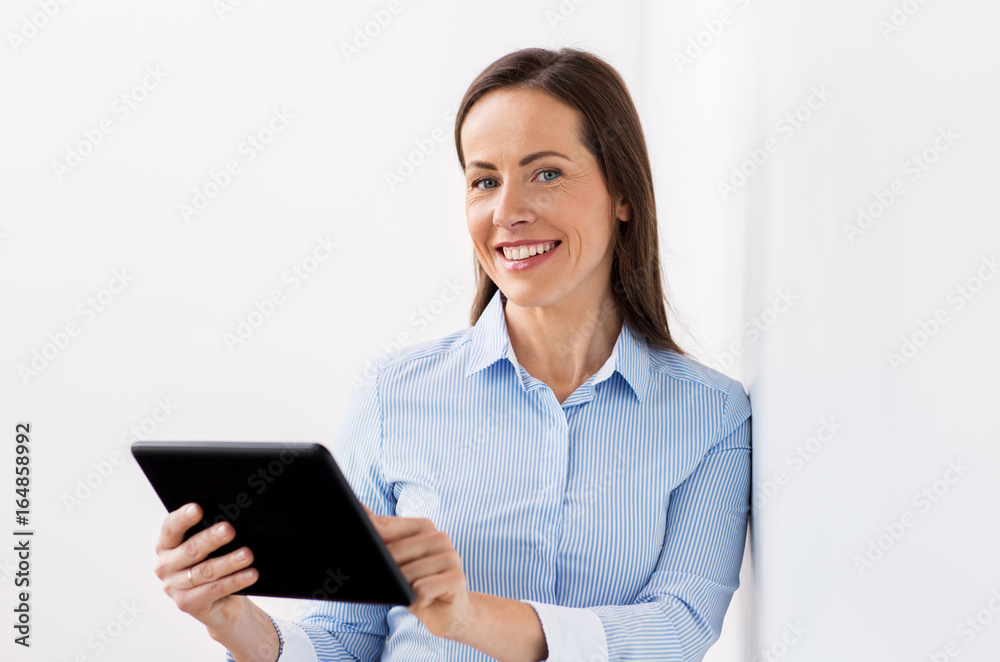 smiling businesswoman with tablet pc computer smiling businesswoman with tablet pc computer
