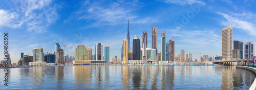 Fotografering DUBAI, UAE - MARCH 29, 2017: The panorama with the new Canal and skyscrapers of Downtown