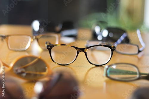 Stylish Eyeglasses on Table photo