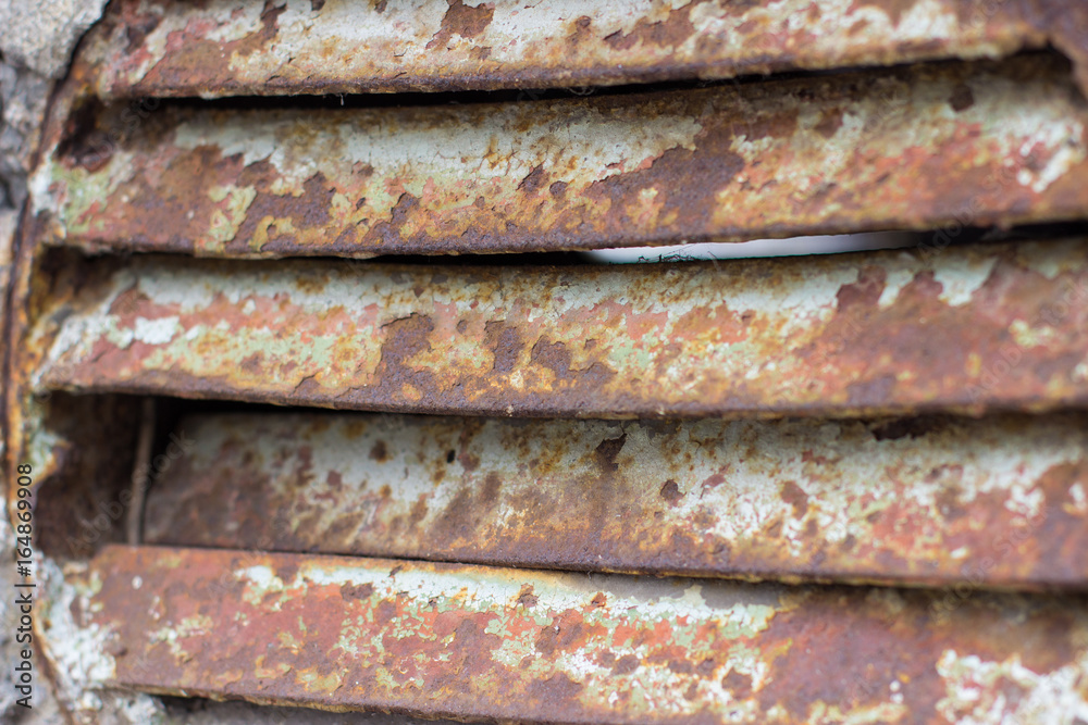 old rusty sewer ventilation grille